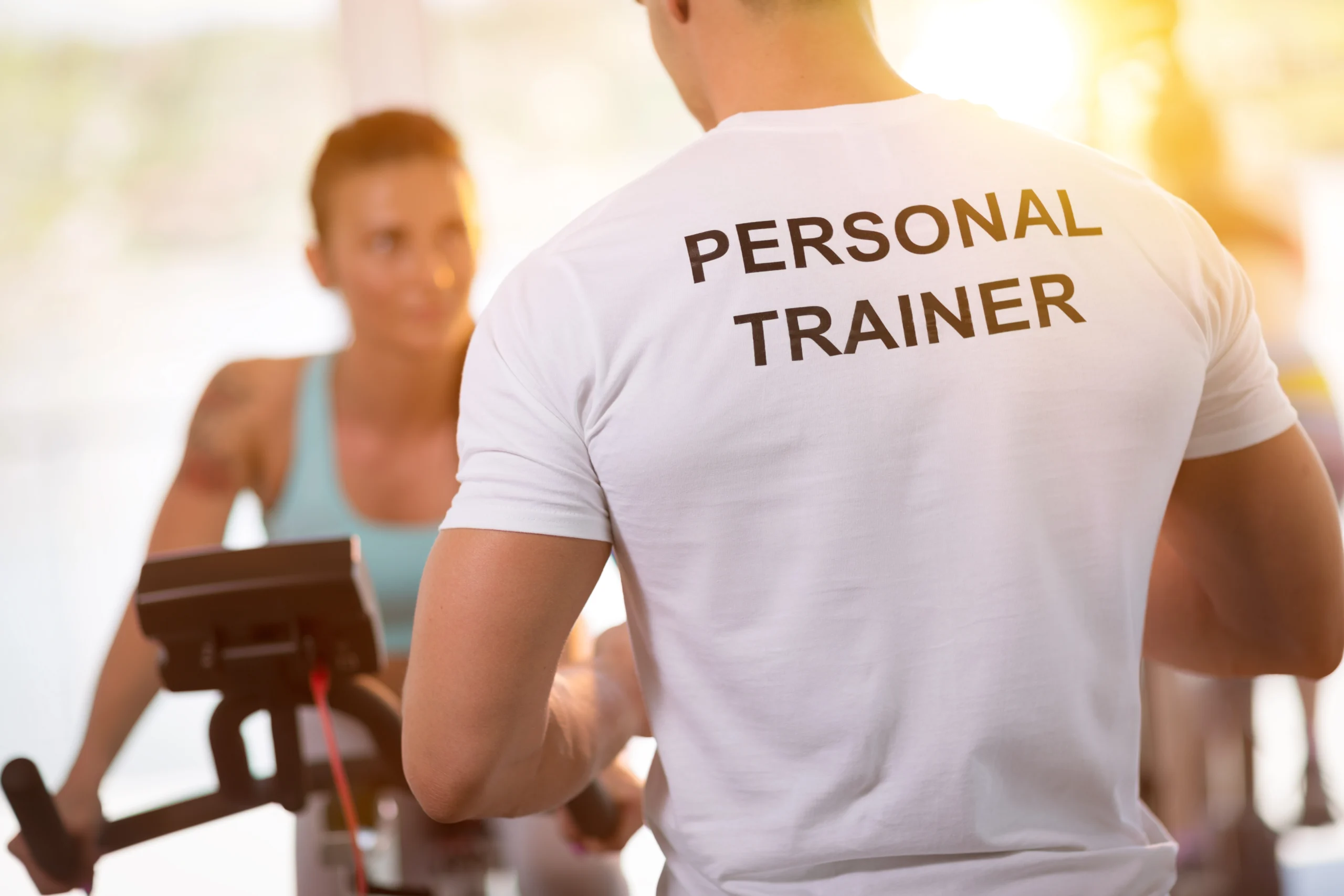 photo of a personal trainer and client working through a personal fitness session.