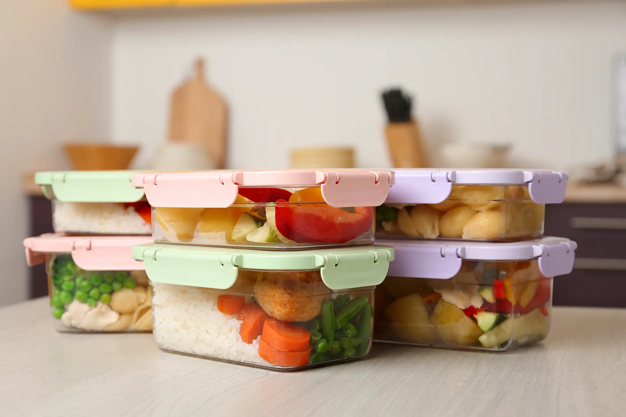 image of food in containers illustrating food prep to maintain your personal fitness goals.